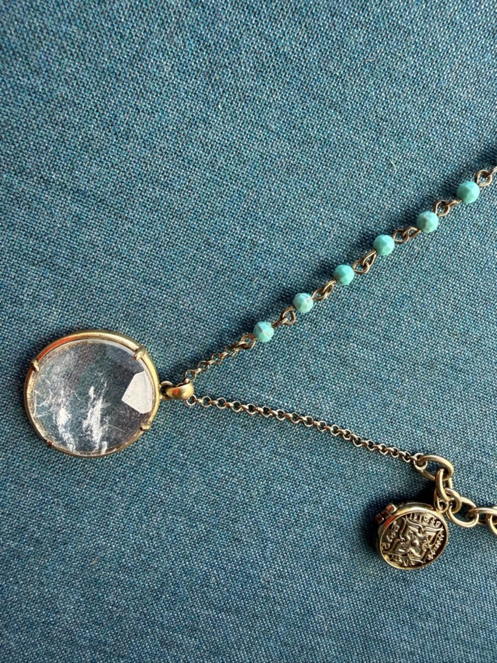 Lucky Brand Gold-Tone Necklace with Turquoise colored beads and side locket.